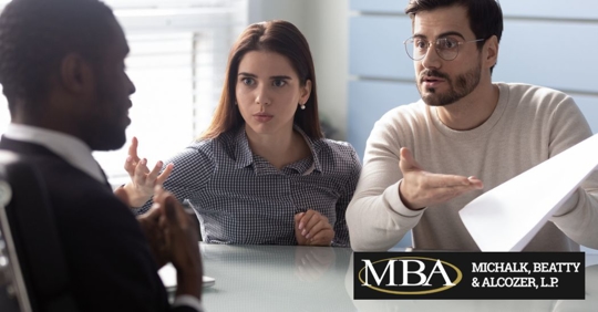 couple talking to a lawyer